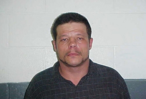 This June 8, 2010 photo provided by the Kay County Detention Center shows Michael Vance. Authorities are searching for Vance, who is suspected in a double slaying and accused of shooting and wounding multiple police officers near Oklahoma City on Sunday, Oct. 23, 2016. (Kay County Detention Center via AP)